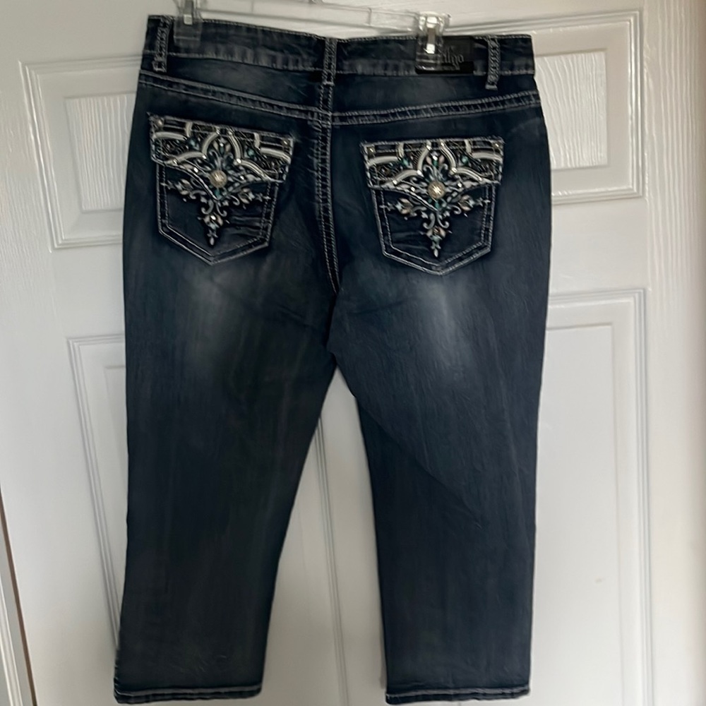 Medium wash capri length with embellishments